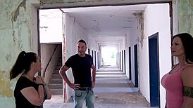 Wild threesome fuck in abandoned barracks with two milfs craving cum.