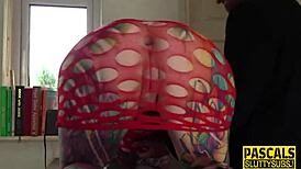 Tattooed submissive slut gags on deep throat