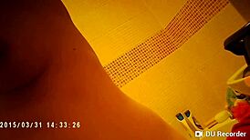 spy camera catches nude tits in the shower