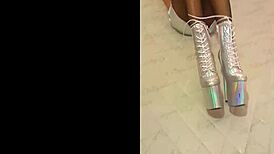 I am wearing total silver and fishnet pantyhose with beautiful ankle boots and very high heels.
