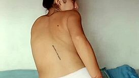 selene strips naked for neighbor's secret gaze