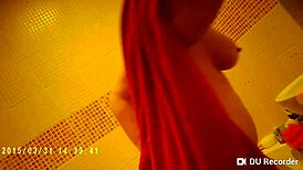 spy camera catches nude tits in the shower