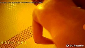 spy camera catches nude tits in the shower