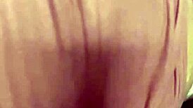 hot blonde boldly shows off huge tits in softcore scene