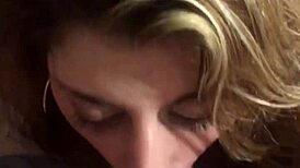 hot milf sucking her husband's hard cock in the bedroom