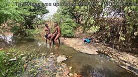 curvy ebony babe ready to be taken hard by the stream