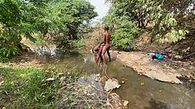 curvy ebony babe ready to be taken hard by the stream