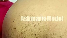 She teases with her hairy armpits legs ass and pussy in a softcore striptease workout showing off barefoot feet and spreading wide.