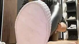 In the world of feet fetish, a girl in leather and nylon socks