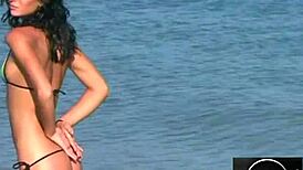 jessica dances sensually in bikini on beach, teasing with erotic moves