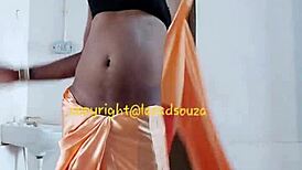 check out indian crossdresser lara dsouza rocking that orange satin saree