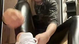 In the world of feet fetish, a girl in leather and nylon socks