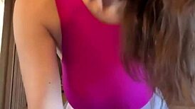 Feeling the intense pleasure as stepmother indulges in her big milky tits on webcam.