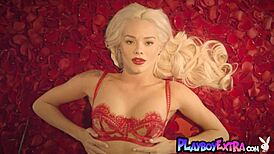 petite blonde teen elsa jean posing among red petals