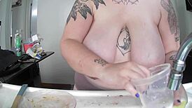 Housewife Does Dishes With Huge Boobies Exposed