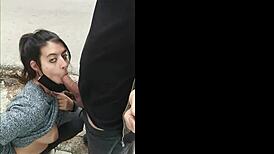 watch this amateur brunette suck dick outdoor in public