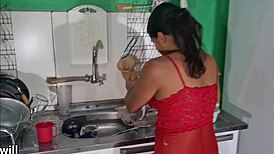 Young babe gives blowjob on all fours in kitchen without condom