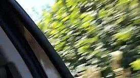 Naughty housewife takes homemade selfie with exposed tits in the car.