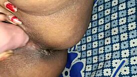 The desi sexy bhabhi grabs her huge dildo and fucks her hairy pussy hard, moaning loudly as she cums