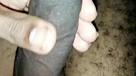 Masturbating with my big black cock balls!
