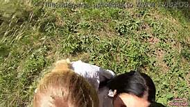 Smoking sluts suck cock and swallow cum in outdoor threesome