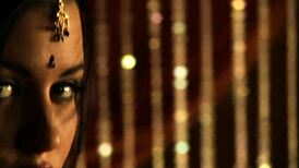 Beautiful Indian woman seduces with her dance