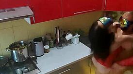 Watch the hidden cam in the kitchen where the MILF gets roughly fucked by amateurs.