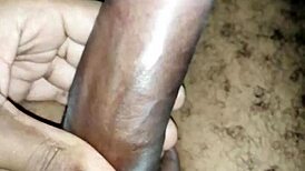 Masturbating with my big black cock balls!