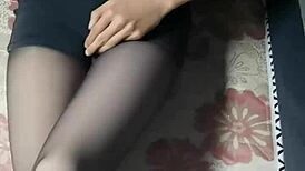 Asian Ladyboy Masturbates in Pantyhose