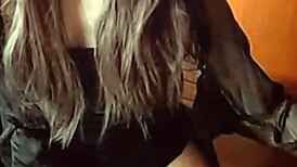 A beautiful shemale masturbates quietly in private.