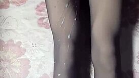 Asian Ladyboy Masturbates in Pantyhose