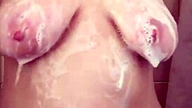 big boob mama showering washing hair & shaving