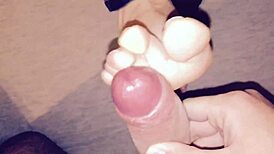 Jessica gives a special footjob with heels.