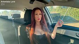 Picture Artemisia Love, sexy Italian milf with big tits and long hair, smoking in the car