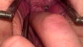 fist queen's pussy stretched with metal ring