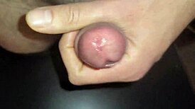 watch this close-up of sticky, slidy precum turning into cum on a european amateur's cock