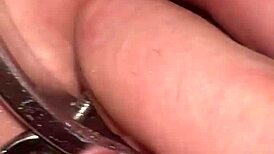 fist queen's pussy stretched with metal ring