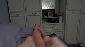 a guy masturbates his big cock in pov