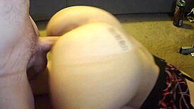 Girlfriend kneels down in front of the desk for cumshot