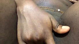 i'm an ebony babe masturbatin' my big wet pussy at home