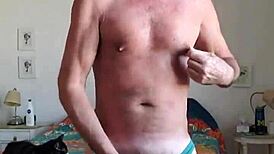 Pervy papifachero is playing with his big daddy boner bulge in turquoise thong!