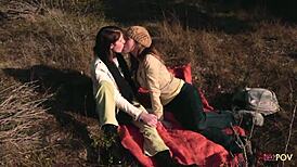 Lesbian couple heats up with strapon outdoors