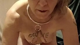 Slave engages in self-degradation session with belt and uro