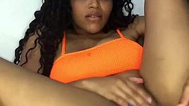 Young Latina with natural big tits masturbating with a dildo?