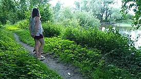 Two girls, a milf and a lady, stop by the road to indulge in golden rain.