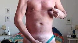 Pervy papifachero is playing with his big daddy boner bulge in turquoise thong!