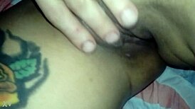 Watch me finger her as she sucks my cock!