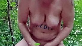 European woman explores outdoor submission in forest