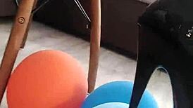 Veve Performs Balloon Popping In Latex Stockings With A Sharp!