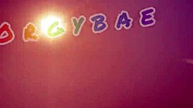 Couple having fun playing voyeur at the public bar and beach